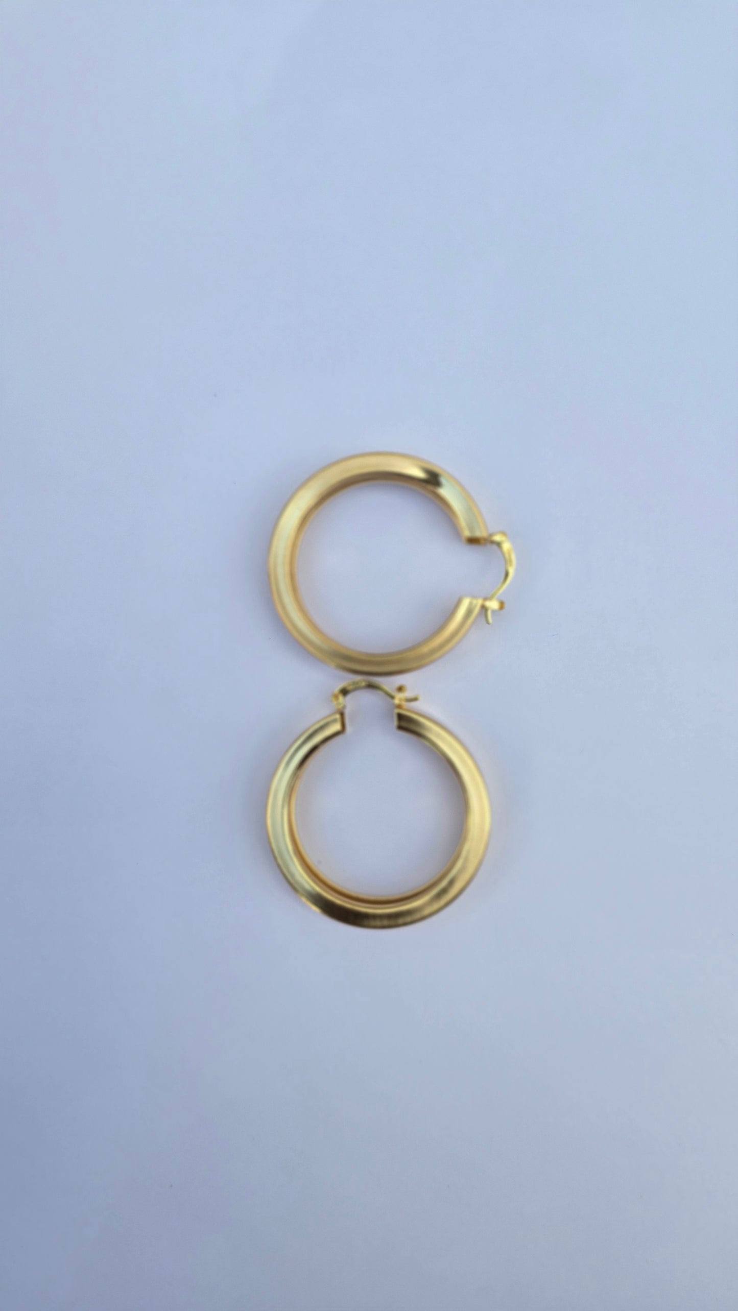 Bold gold hoop earrings